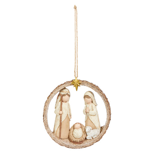 Decorative hanging ornament with figures of Mary and Joseph, baby Jesus, and a sheep in a circular wreath on a white background.