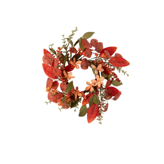 Decorative wreath with red and orange leaves on a white background
