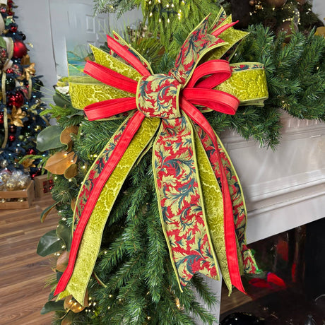 20 inch Crimson Tapestry Noel hand-tied designer bow with green velvet, red satin and red-green tapestry ribbon, on a garland