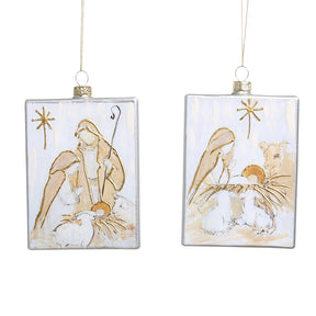 Two rectangular glass Christmas ornaments depicting a nativity scene with Mary, Joseph, and baby Jesus.