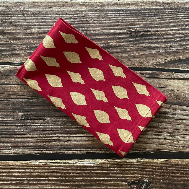 18" Gold Ornament on Red Holiday Napkin