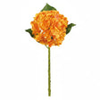 Artificial orange flower with green leaves on a white background