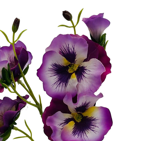 Purple and white flowers with green stems on a light gray background