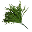 Green leafy branch on a grid background