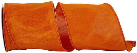 A roll of tangerine orange dupioni wired edge ribbon.