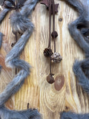 Tree pinewood pes fur, bells, pinecones