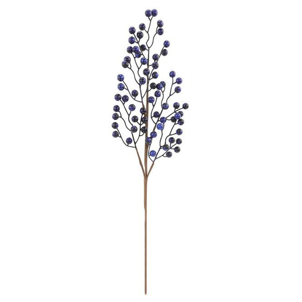 Artificial plant branch with blue berries on a white background