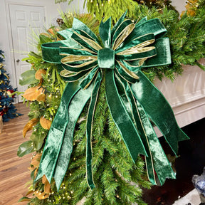 20 inch Emerald Velvet Classic hand-tied Christmas designer bow with emerald green velvet and gold-edged ribbon, on a garland