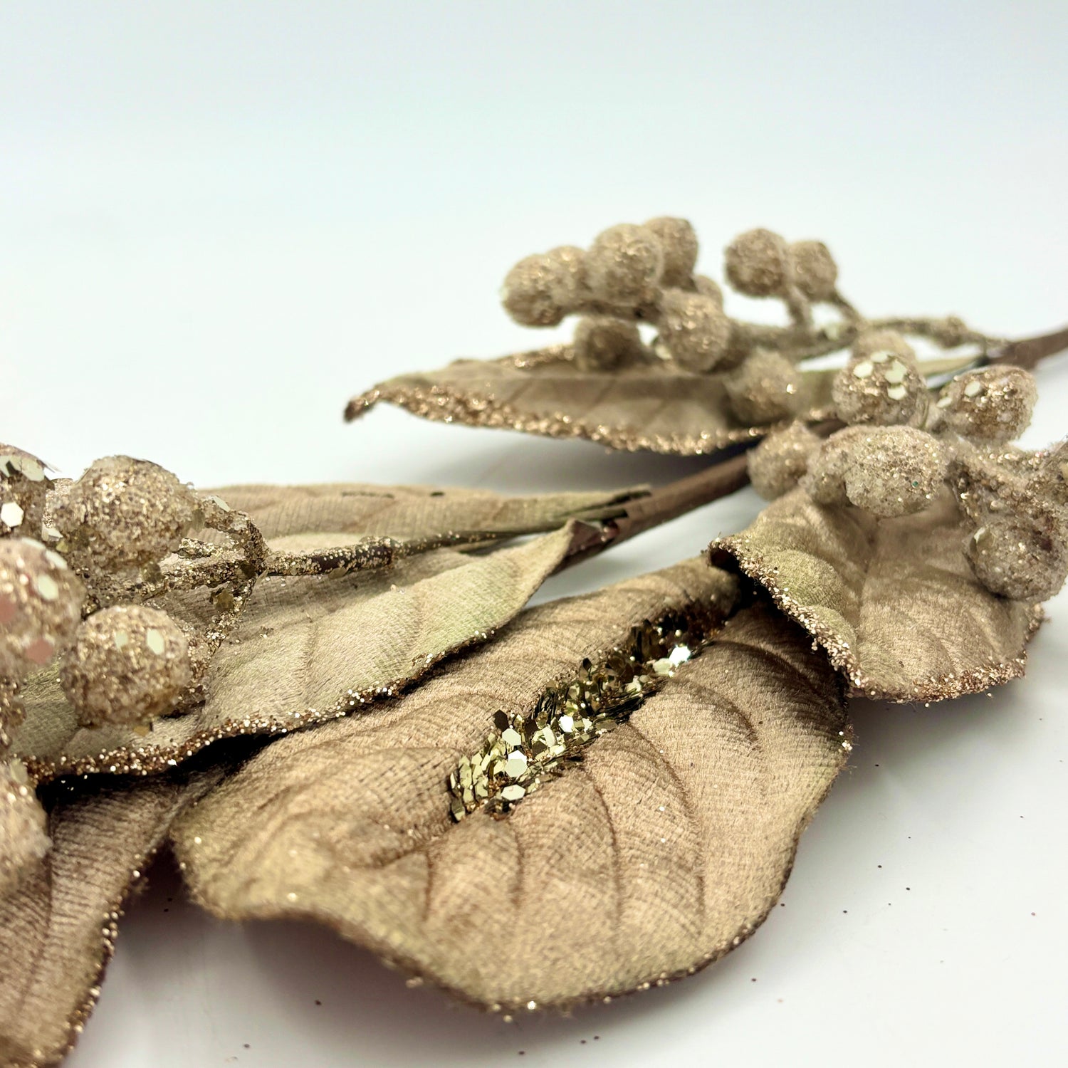 22" Champagne Micro Beaded Magnolia Leaf Berry Spray