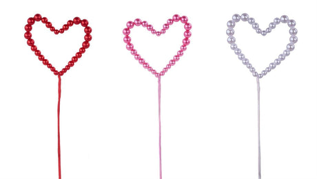 Three heart-shaped beaded picks on sticks, shown in red, pink, and silver, isolated on a white background.