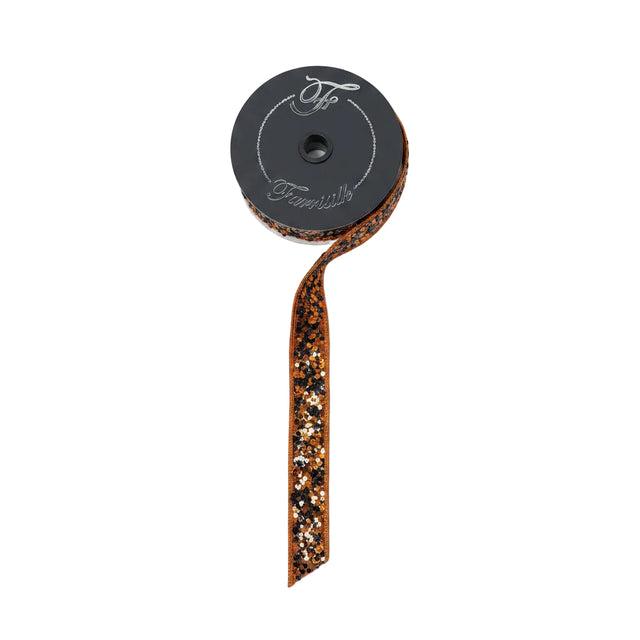 A roll of Farrisilk wired ribbon with a dark gray spool, shown on a light wood background. The ribbon features a metallic bronze glitter border with small black and orange sequins.