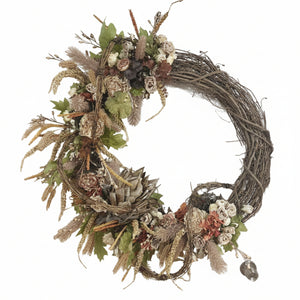 Decorative wreath with flowers and branches on a white background