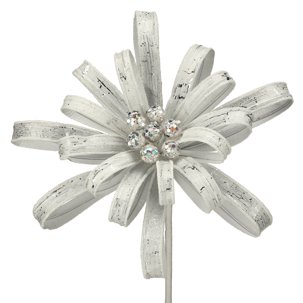 Decorative flower on a stick with white petals and a central gemstone against a white background