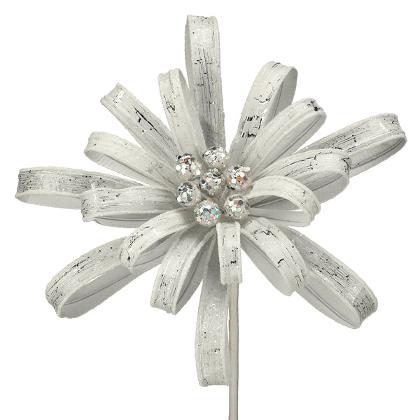 Decorative flower on a stick with white petals and a central gemstone against a white background
