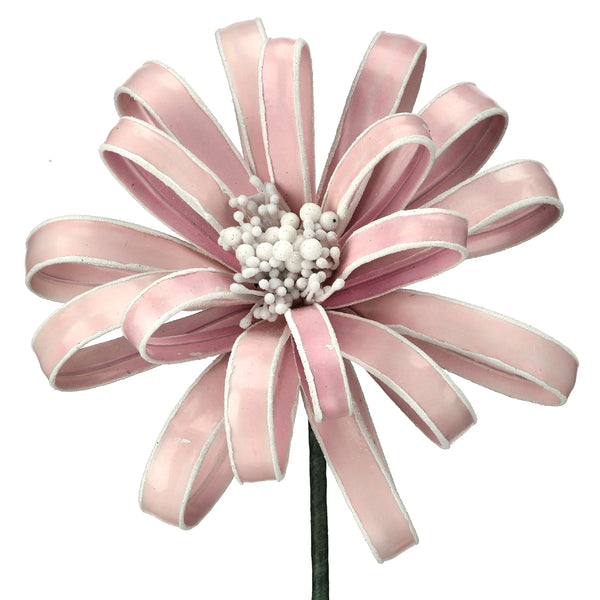 Decorative flower made of pink ribbons on a white background