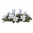 Decorative candle holder with white flowers and green leaves on a white background