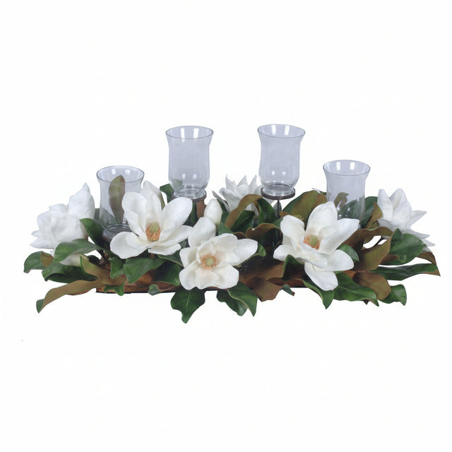 Decorative candle holder with white flowers and green leaves on a white background