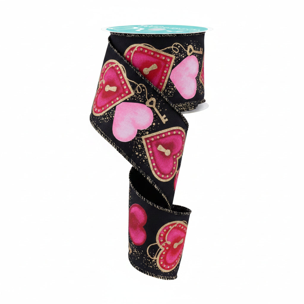 Decorative wired ribbon with pink hearts and gold accents on a black background