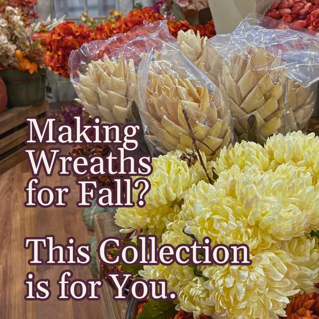 Display of fall-themed wreaths and floral arrangements with text promoting a collection for making wreaths.
