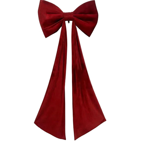 A huge deep red velvet bow with long, flowing tails, displayed against a plain white background. 