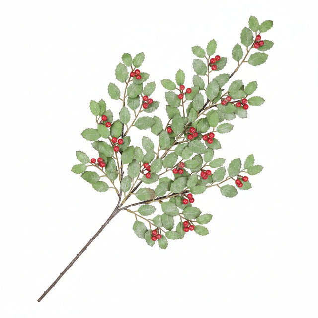 An artificial holly branch with green leaves and small red berries on a white background.