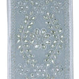 A close-up of silver fabric panel featuring intricate silver and white floral embroidery with sequins and beadwork, framed by a decorative border.