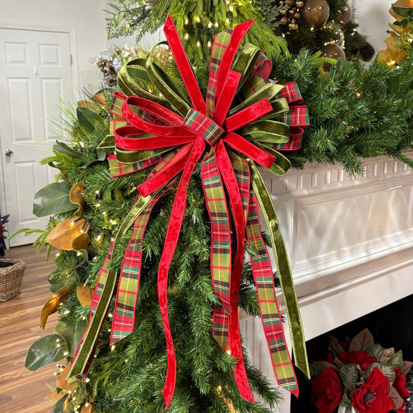 17 inch Highland Holiday hand-tied Christmas designer bow with green and red tartan, olive and red velvet ribbon, styled as a tree topper on a garland