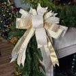 20 inch Golden Elegance hand-tied Christmas designer bow with gold velvet dots, champagne dupion and metallic bar ribbon, on a garland