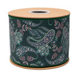 A spool of decorative ribbon with a dark green background and a detailed paisley pattern in teal, white, and pink, mounted on natural wood spools.